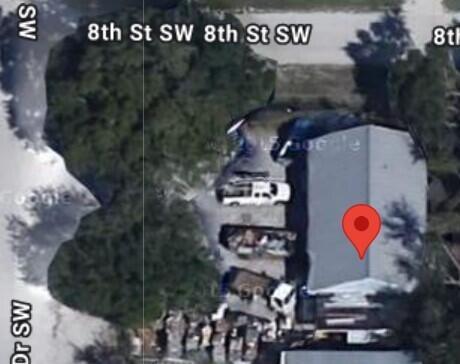 This is a satellite map view showing a residential building with a driveway and vehicles — 816 SW 11th Dr Drive SW, Vero Beach FL 32962, VERO BEACH, FL