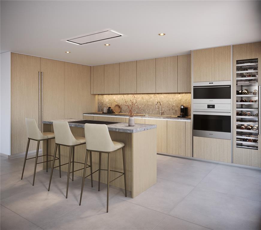 This is a rendering of a modern kitchen featuring light wood cabinetry and a stone island — The Icon 1120 ASHFORD AVE UNIT 702, SAN JUAN, PR