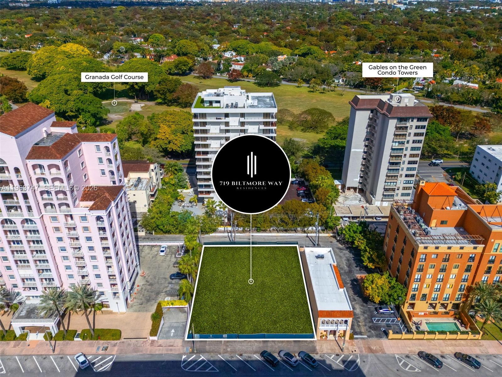 An aerial view shows a vacant rectangular lot situated between two multi-story residential buildings — 719 Biltmore Way, Coral Gables FL 33134, CORAL GABLES, FL