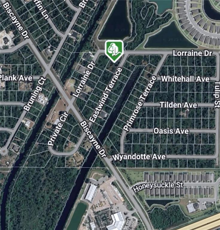 This is a satellite map view of a residential neighborhood with streets and property lines — 2096 LORRAINE DRIVE, PORT CHARLOTTE, FL