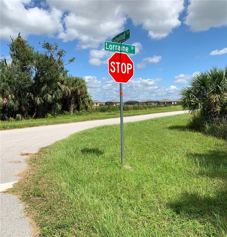 A stop sign stands at the intersection of Eastwind Terrace and Lorraine Drive — 2096 LORRAINE DRIVE, PORT CHARLOTTE, FL