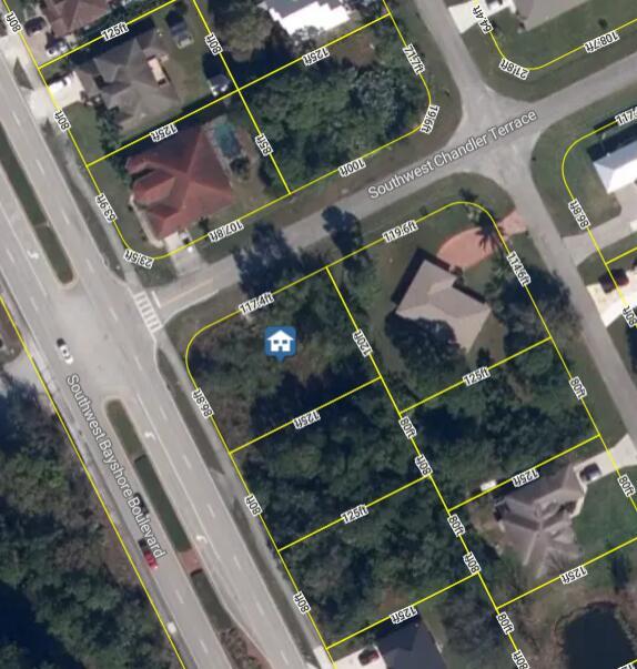 This is a satellite map view showing a vacant residential lot outlined in yellow — 398 SW Chandler Terrace, Port St. Lucie FL 34984, PORT ST. LUCIE, FL