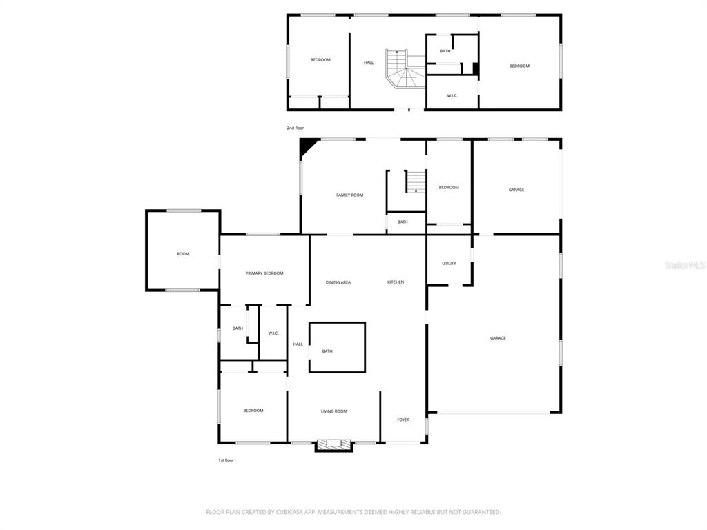 This is a floor plan showing the layout of a two-story residential house — 555 WILDWOOD DRIVE, NEW SMYRNA BEACH, FL