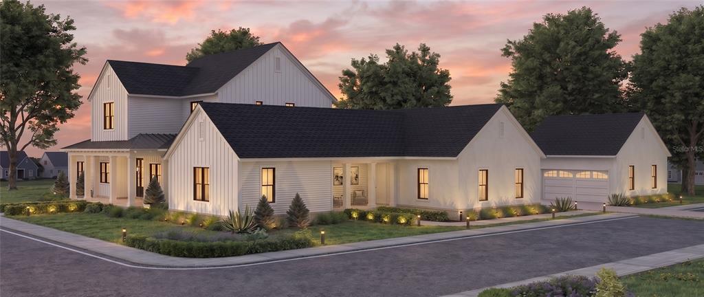 This is a rendering of a two-story white farmhouse with a garage at sunset — 312 BRILEY AVENUE, OAKLAND, FL