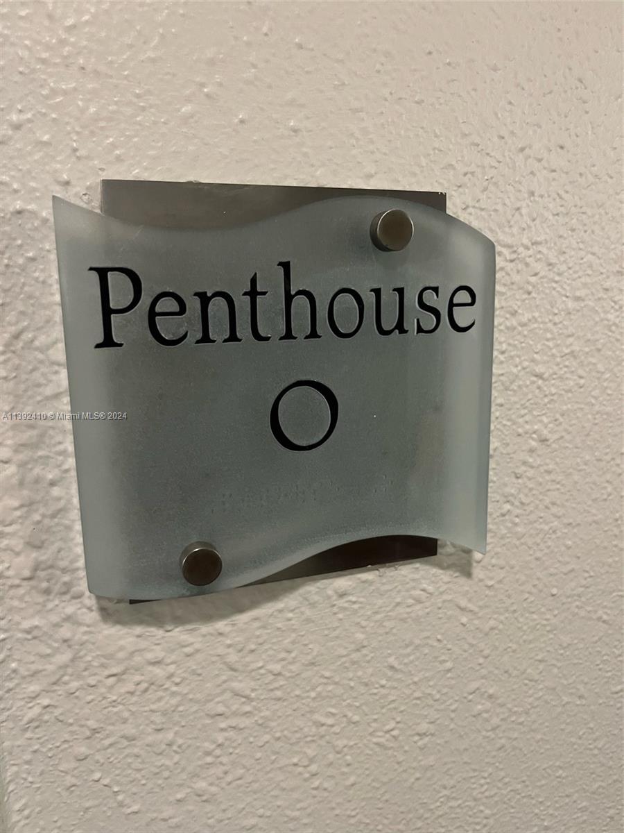 A sign on a textured wall identifies the unit as Penthouse O — 3901 S S Ocean dr, Hollywood FL 33019, HOLLYWOOD, FL
