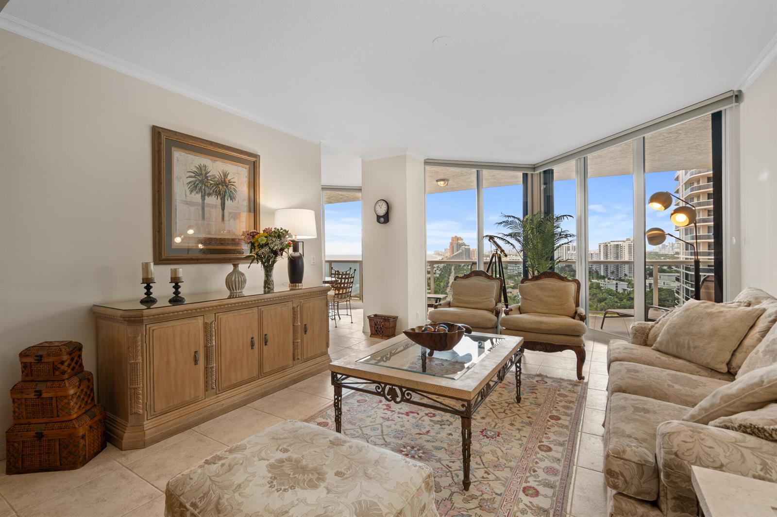 A living room features a beige sofa, two armchairs, a coffee table, and floor-to-ceiling windows — 3200 N Ocean Boulevard # 1506, Fort Lauderdale FL 33308, FORT LAUDERDALE, FL