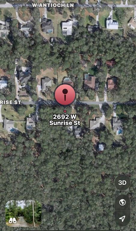 This is a satellite map view showing a residential street with houses and surrounding trees — 2692 W SUNRISE STREET, LECANTO, FL