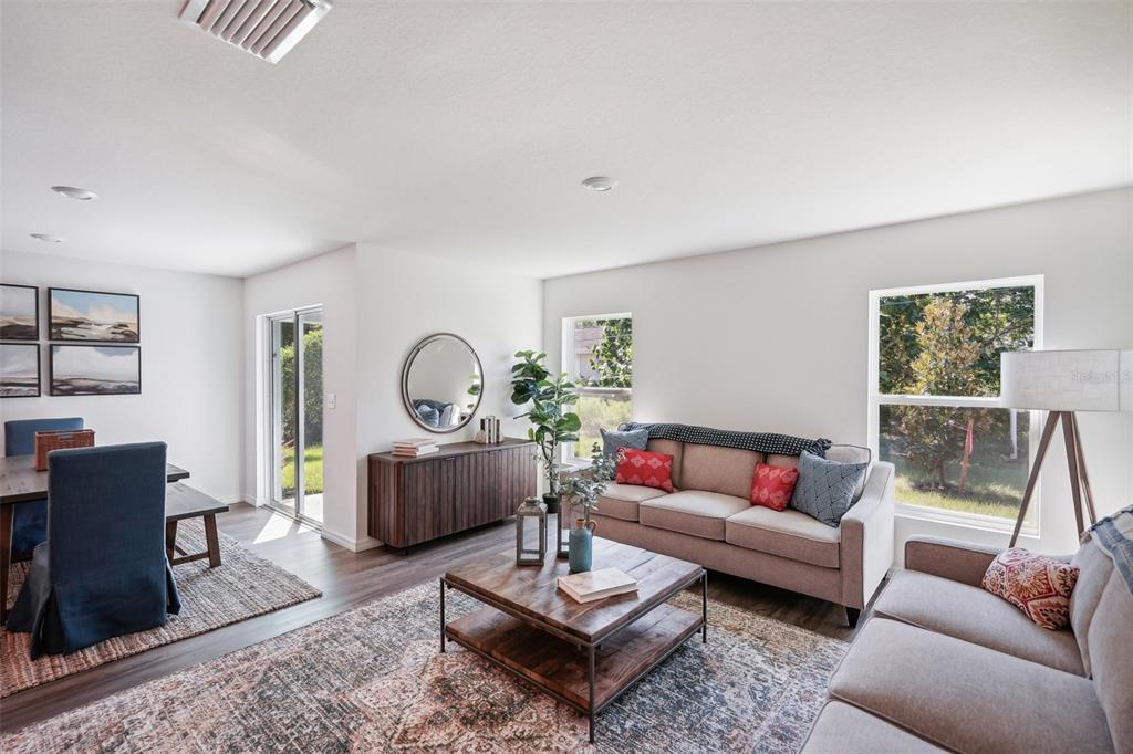 This image displays a list of exterior and interior features for a residential property — 3521 DAHLIA DRIVE, LAKE HAMILTON, FL