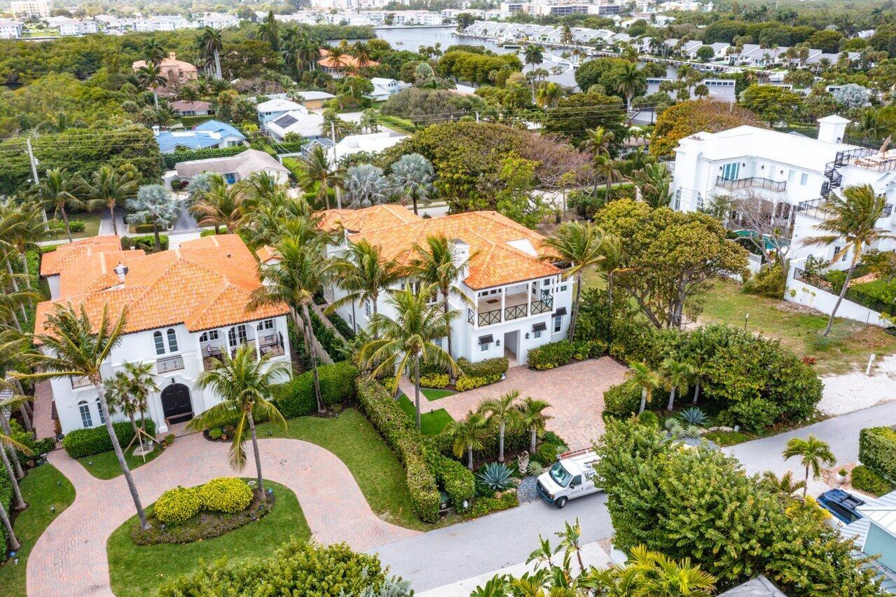 An aerial view shows two white houses with orange tile roofs and paved driveways — 6103 N Ocean Boulevard N, Ocean Ridge FL 33435, OCEAN RIDGE, FL