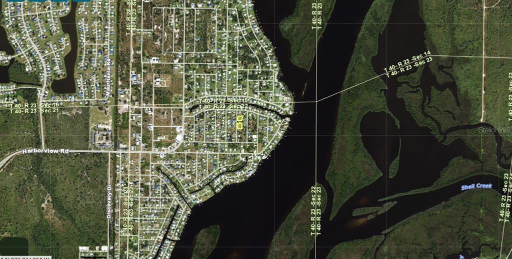 This is an aerial map showing a residential neighborhood located along a waterway — 3030, 3034 , 3038 , 3050 DAFFODIL TERRACE, PUNTA GORDA, FL