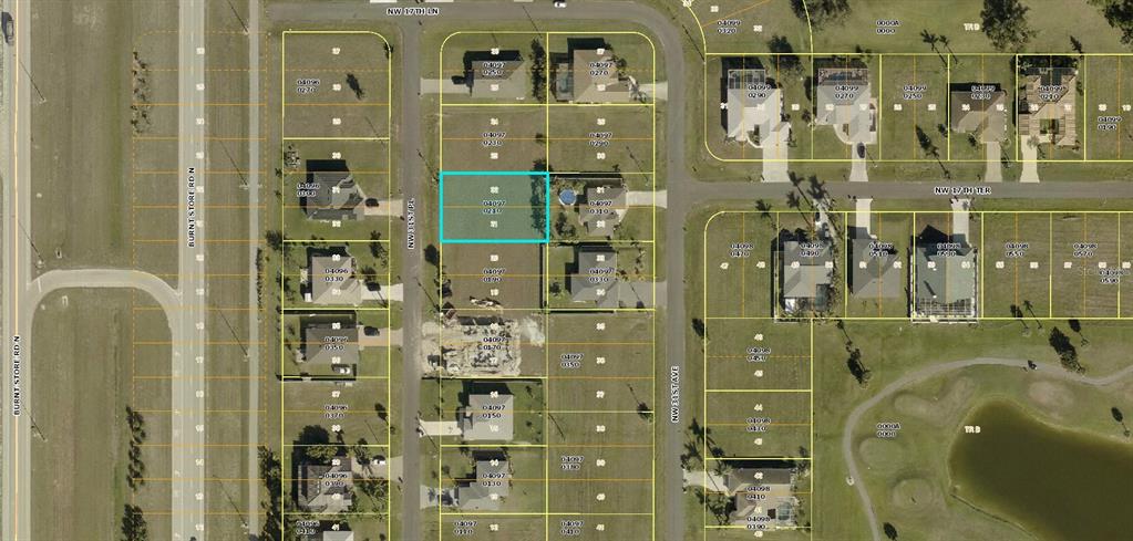 This is an aerial map showing a vacant residential lot highlighted in blue — 1641 NW 31ST PLACE, CAPE CORAL, FL