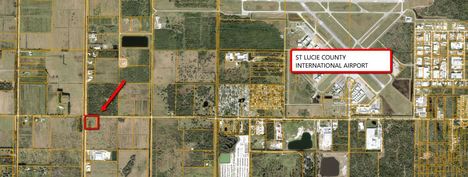 This map shows a property highlighted by a red arrow near St. Lucie County International Airport — 2700 N Kings Highway, Fort Pierce FL 34946, FORT PIERCE, FL