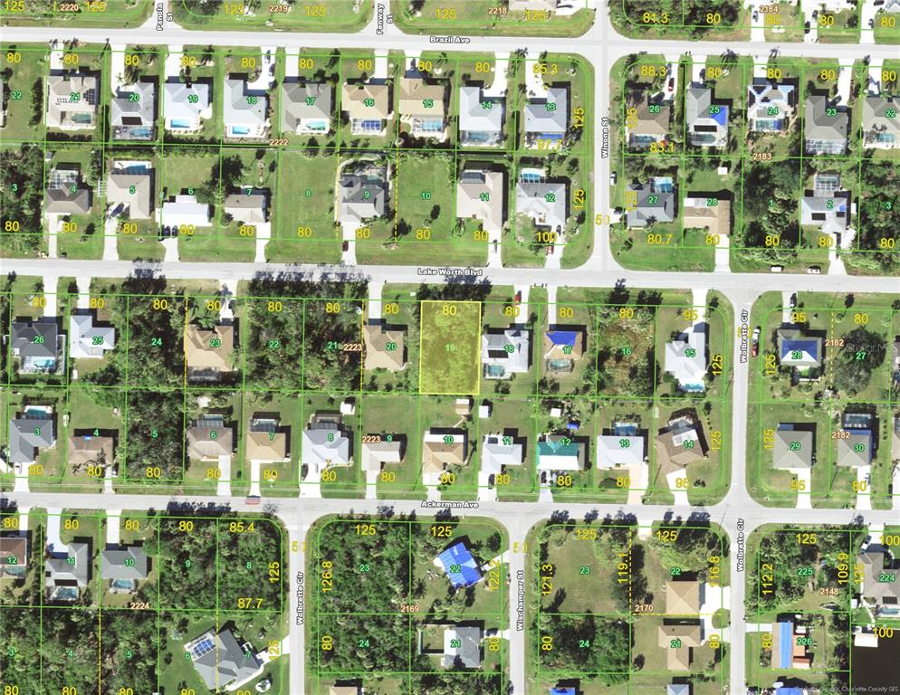 This is an aerial map showing residential lots and streets in a suburban neighborhood — 18103 LAKE WORTH BOULEVARD, PORT CHARLOTTE, FL