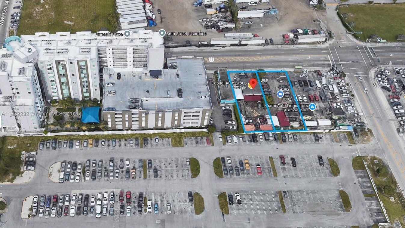 This aerial map shows a commercial property with two adjacent car dealerships and parking lots — 3634 NW 36th St, Miami FL 33142, MIAMI, FL