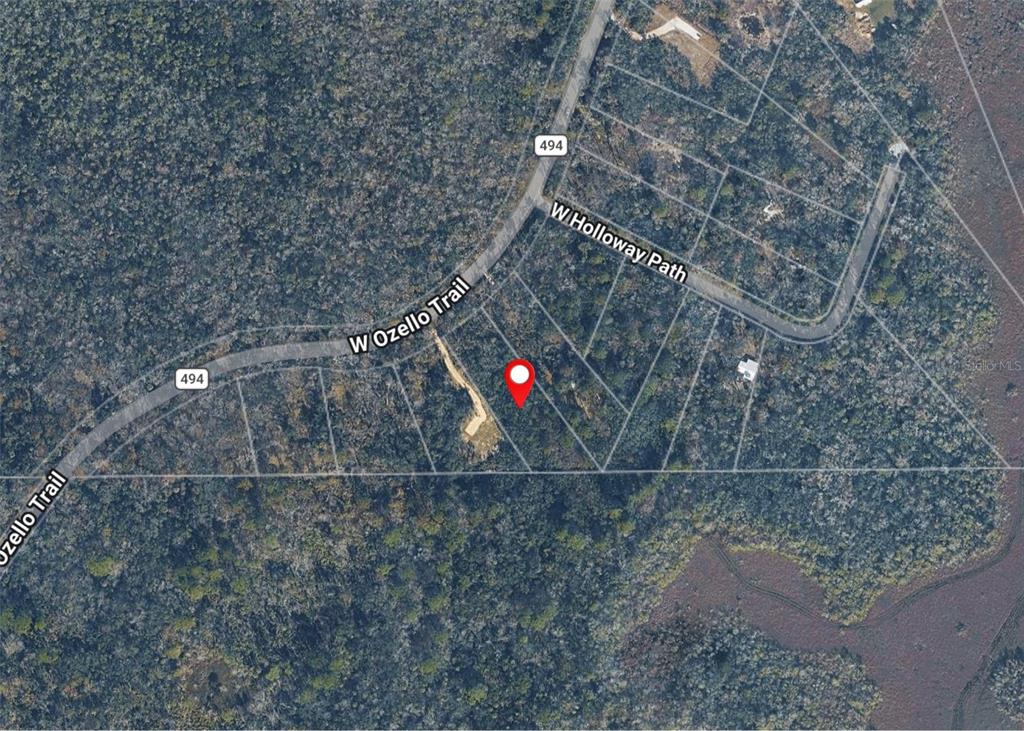 An aerial map view shows a vacant lot marked with a red pin near roads — 10274 W OZELLO TRAIL, CRYSTAL RIVER, FL
