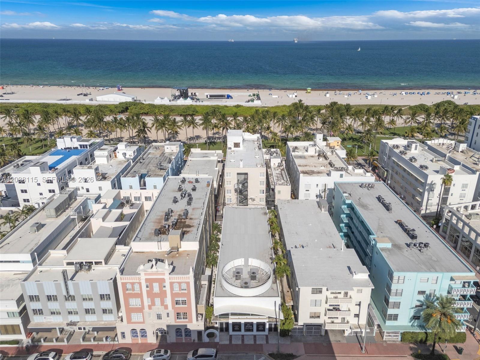 An aerial view shows a row of beachside buildings with flat roofs and palm trees — 721 Collins Ave, Miami Beach FL 33139, MIAMI BEACH, FL