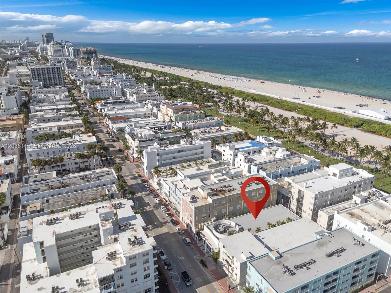 An aerial view shows a multi-story building in a dense urban beachside neighborhood — 721 Collins Ave, Miami Beach FL 33139, MIAMI BEACH, FL