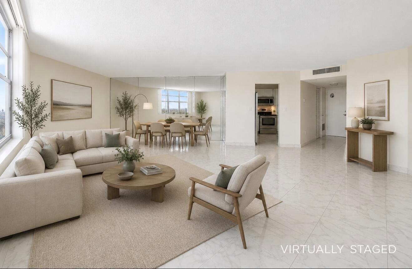 A virtually staged living and dining area with light tile floors and a mirrored wall — 2750 NE 183rd Street Ph, Aventura FL 33160, AVENTURA, FL