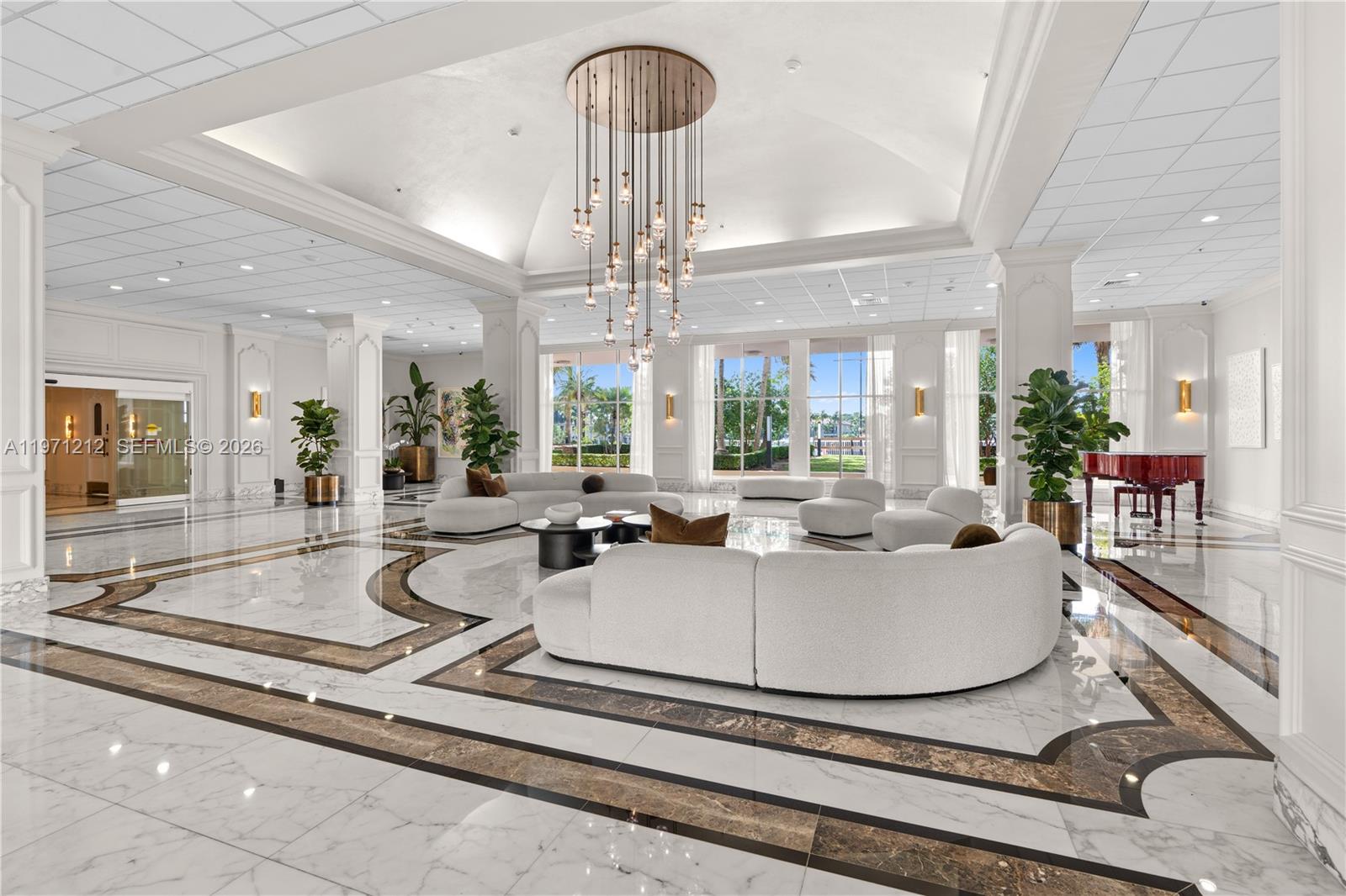 A bedroom features a black bed frame with wooden slats, two white nightstands, and carpet — 5600 Collins Ave # 16Y, Miami Beach FL 33140, MIAMI BEACH, FL