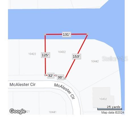 This map shows the property boundaries and dimensions of a waterfront residential lot — 10432 MCALESTER CIRCLE, PORT CHARLOTTE, FL