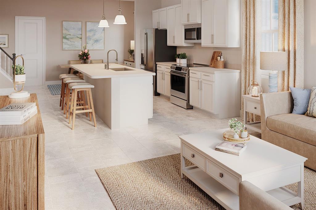 This rendering shows an open-concept kitchen with white cabinets, a central island, and a living area — 3605 MOCKING BIRD DRIVE, AUBURNDALE, FL