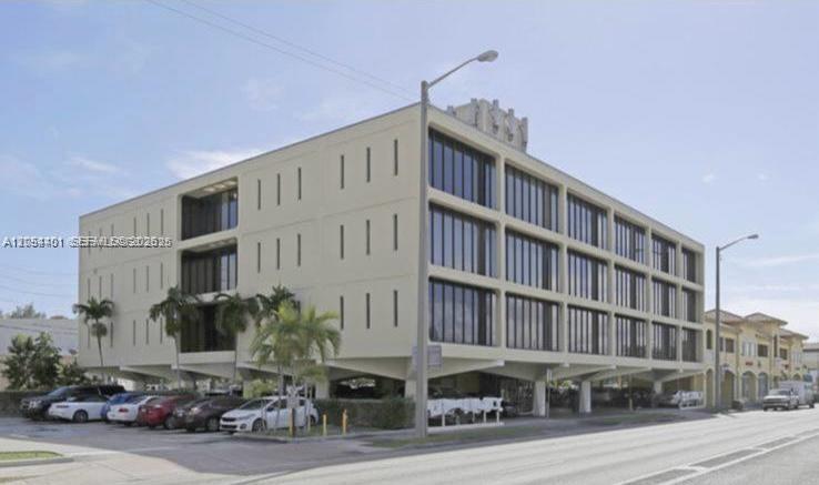 A multi-story commercial office building with a ground-level parking area and a flat roof — 420 S Dixie Hwy, Coral Gables FL 33146, CORAL GABLES, FL