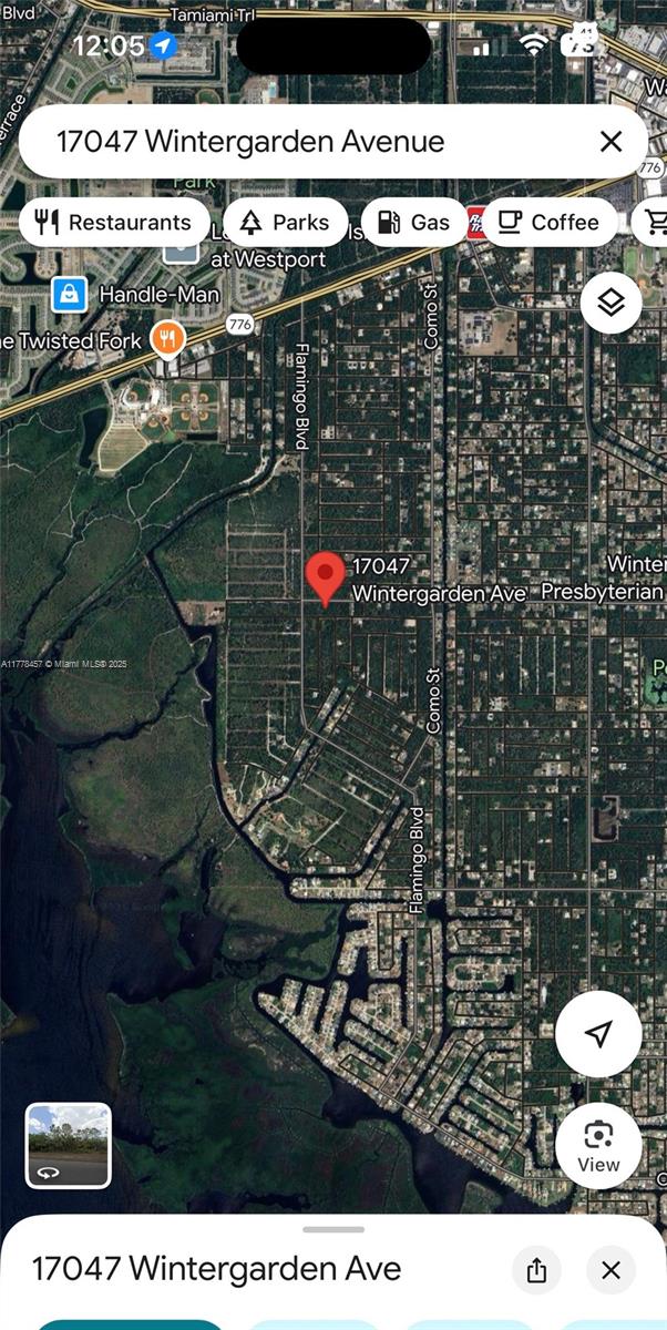 This is a satellite map view showing a residential area with a red location pin — 17047 wintergarden, Port Charlotte FL 33948, PORT CHARLOTTE, FL