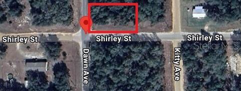 This aerial map shows a vacant, wooded rectangular lot located at a street intersection — 600 DAWN AVENUE, INTERLACHEN, FL