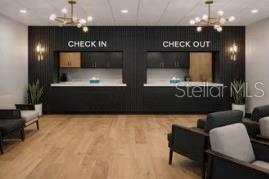 This is a rendering of a modern office reception area with check-in and check-out counters — 2511 W MLK BOULEVARD, TAMPA, FL