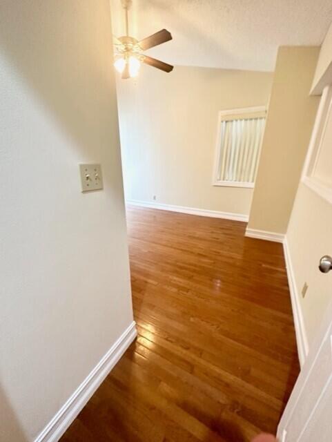 A room with hardwood floors, a ceiling fan, and a window with vertical blinds — 3021 Florida Boulevard, Delray Beach FL 33483, DELRAY BEACH, FL