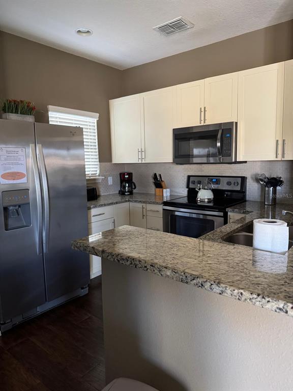 8981 SHINE DRIVE, KISSIMMEE, FL — photo 4 of 23