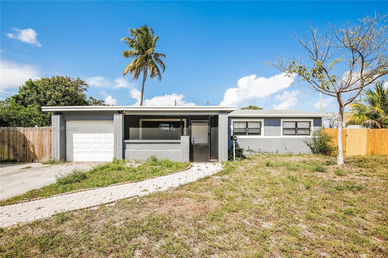311 NW 42nd St, Deerfield Beach FL 33064
