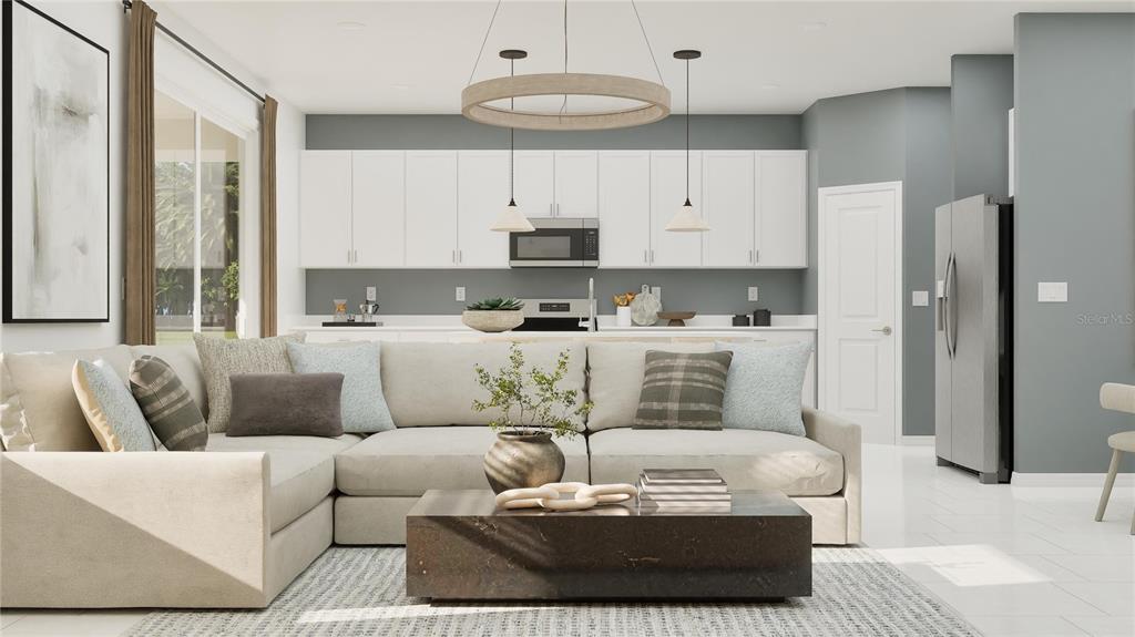 This is a rendering of a modern living room featuring a sectional sofa and kitchen — 8223 SAINT KITTS CIRCLE, ENGLEWOOD, FL