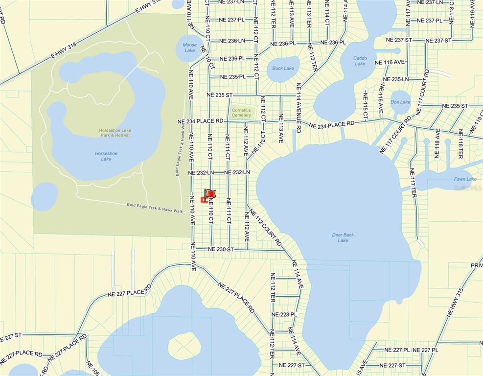 This is a map showing roads and lakes in a residential area — TBD NE 110TH COURT, FORT MC COY, FL