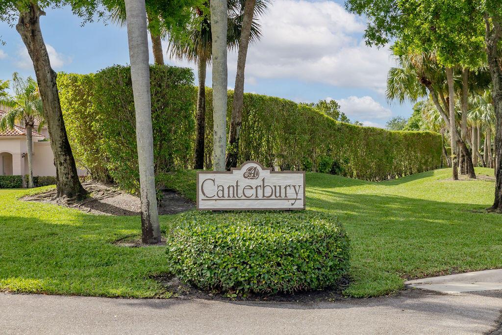 A sign reading Canterbury sits in front of a manicured hedge and palm trees — 8050 Aberdeen Drive # 202, Boynton Beach FL 33472, BOYNTON BEACH, FL