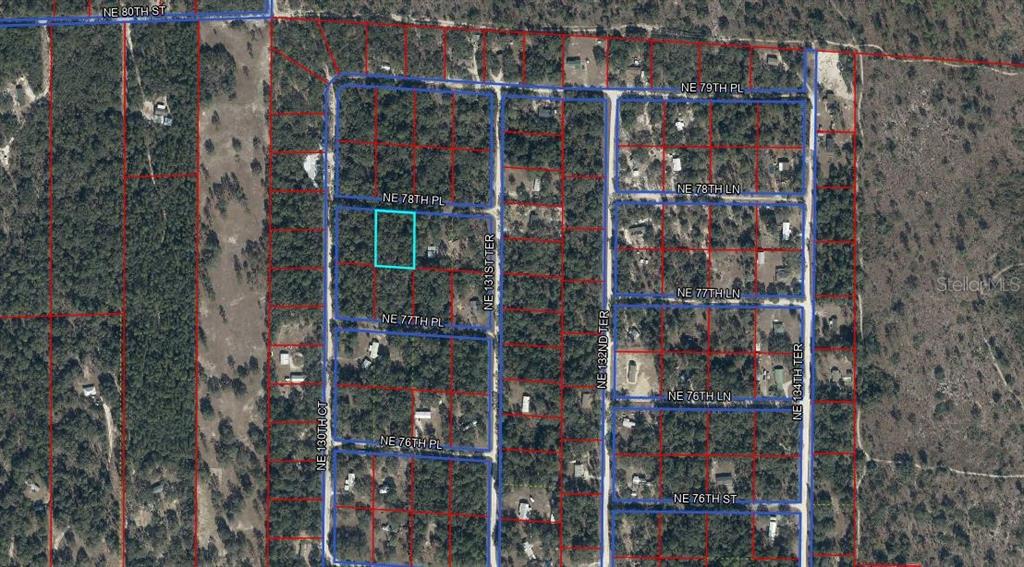 This is an aerial map showing a highlighted parcel of land among wooded residential lots — 13070 NE 78TH PLACE, BRONSON, FL
