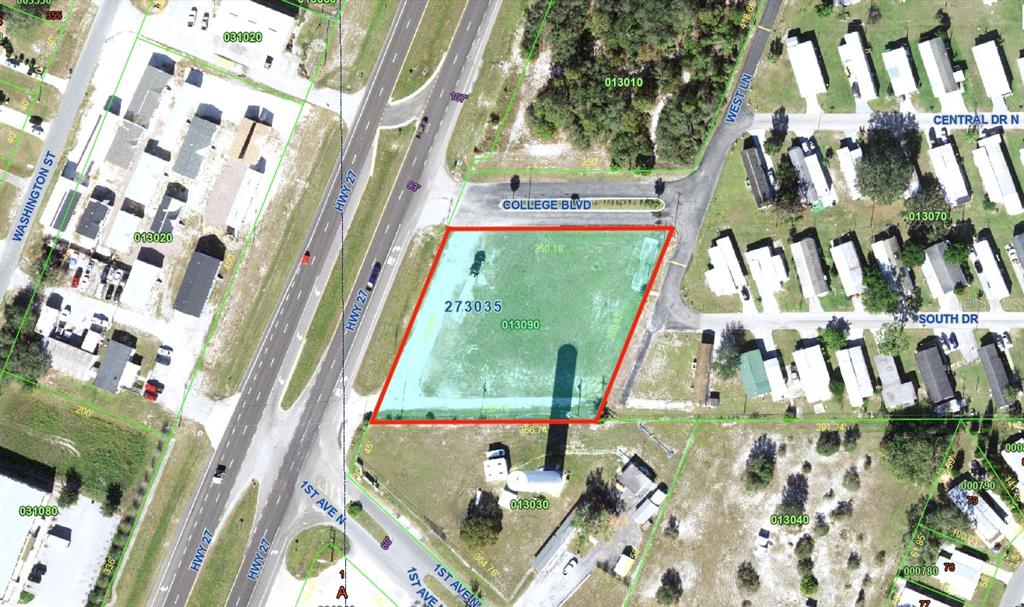 This is an aerial map showing a vacant lot highlighted in red near a highway — US HIGHWAY 27 S, LAKE WALES, FL