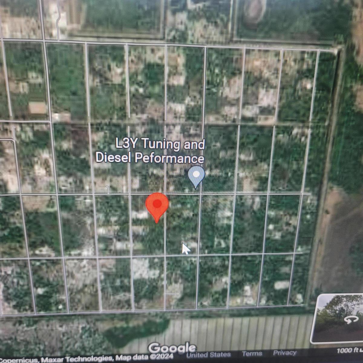 This is a satellite map view showing a red location pin over a wooded area — 730 S Willow, Clewiston FL 33440, CLEWISTON, FL