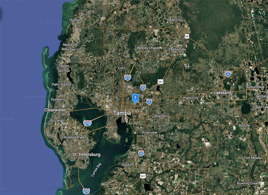 This is a satellite map showing the Tampa Bay area and surrounding cities in Florida — 3817 N 58TH STREET, TAMPA, FL