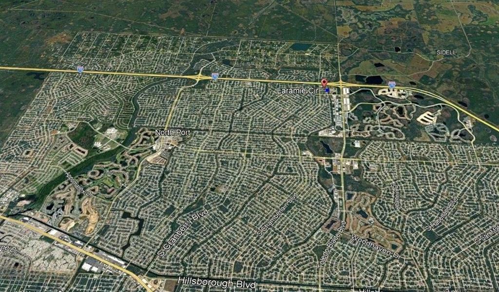 This is an aerial map view of a residential neighborhood in North Port, Florida — Lot 24 LARAMIE CIRCLE, NORTH PORT, FL