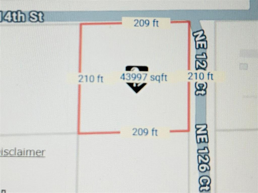 A map shows a rectangular plot of land measuring 209 feet by 210 feet — 0 NE 126TH COURT, WILLISTON, FL