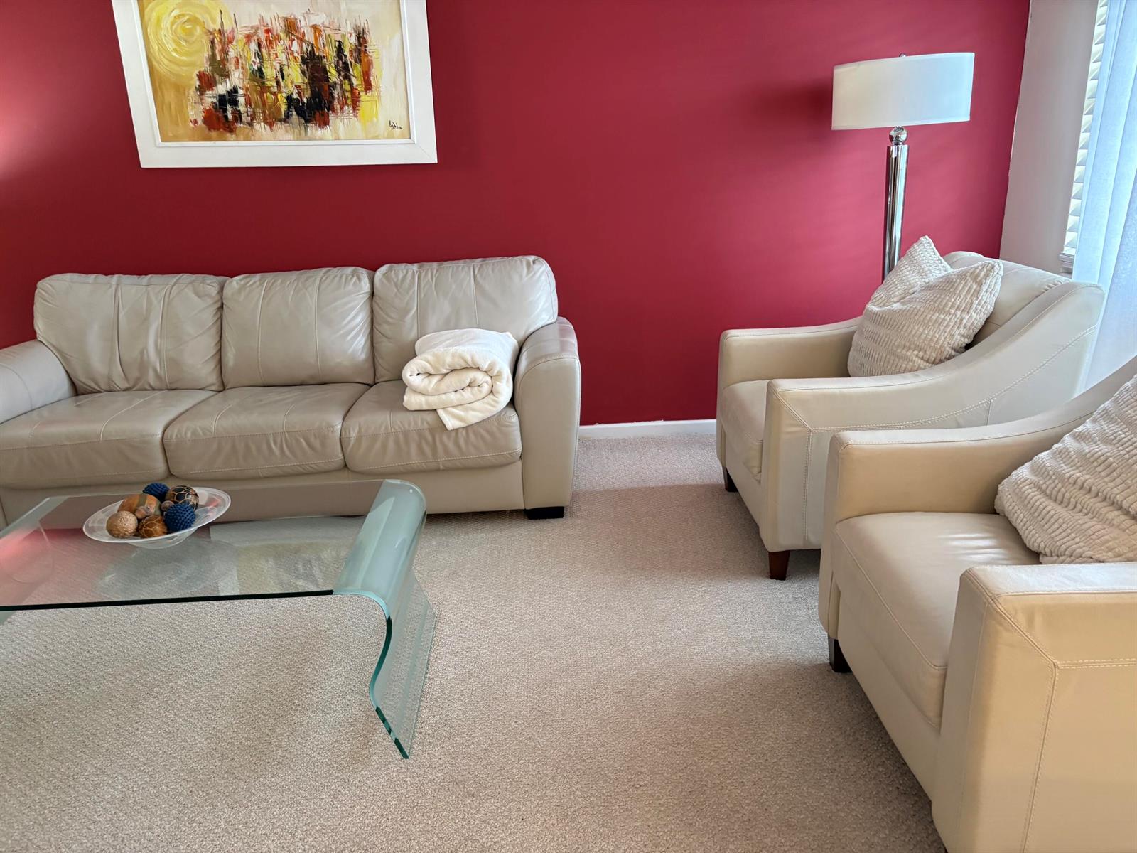 A living room features a beige leather sofa, two matching armchairs, and a glass coffee table — 112 Preston Way # C, Boca Raton FL 33434, BOCA RATON, FL