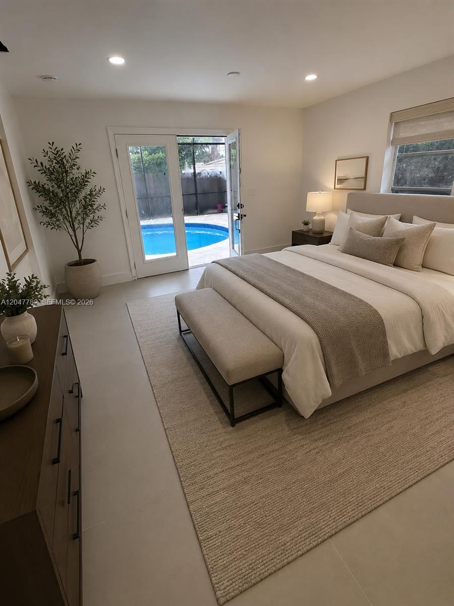 A bedroom features a bed, a bench, a dresser, and glass doors opening to a pool — 4380 SW 49th Ct # 0, Dania Beach FL 33314, DANIA BEACH, FL