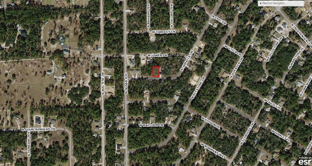 This is an aerial map view showing a highlighted rectangular property lot in a residential area — 7830 N JAMAICA DRIVE, CITRUS SPRINGS, FL
