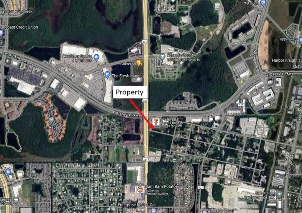 This is an aerial map showing a property location near the intersection of two highways — BARN STREET, KISSIMMEE, FL