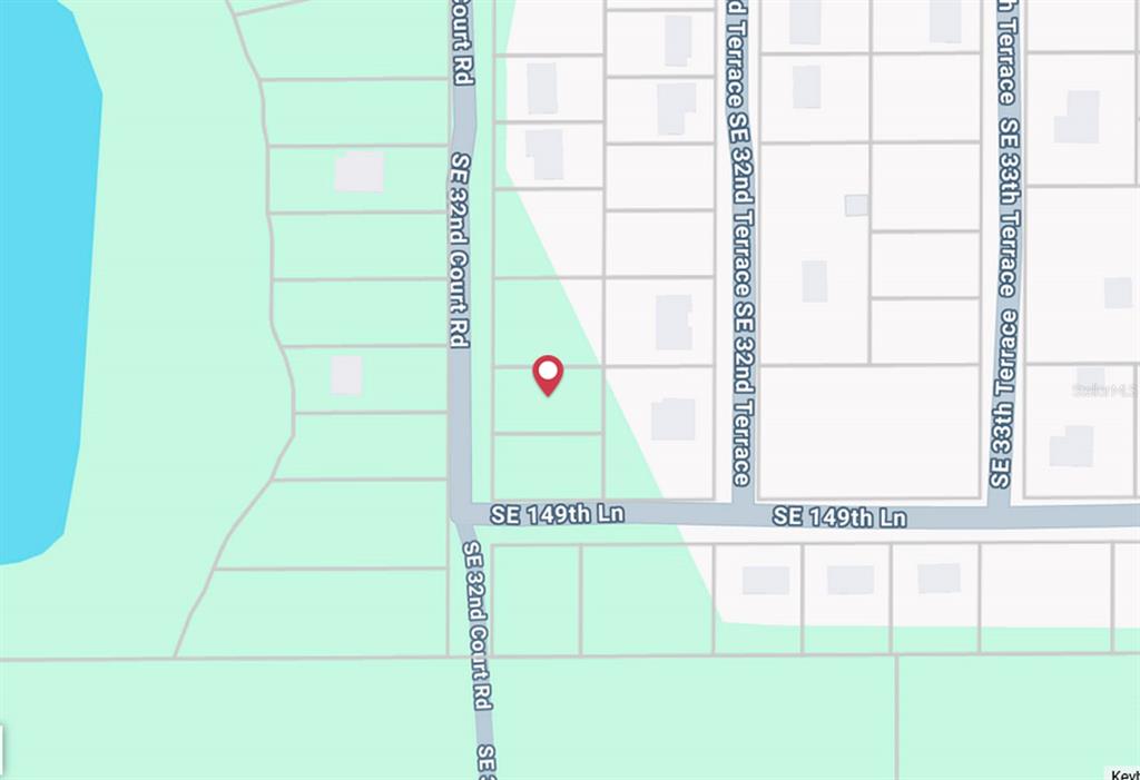 This is a map showing a residential lot marked with a red pin — tbd SE 32ND COURT ROAD, SUMMERFIELD, FL