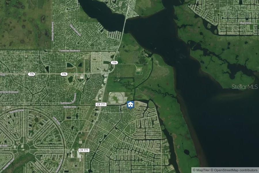 This is a satellite map showing a residential area near a body of water — 8070 THRUSO ROAD, PORT CHARLOTTE, FL