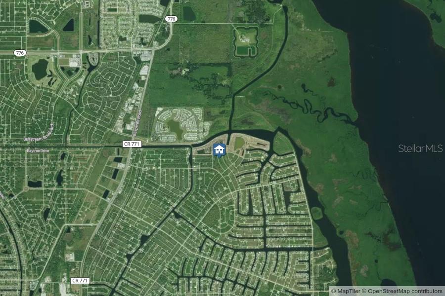This is a satellite map showing a residential neighborhood with a house icon marking a property — 8070 THRUSO ROAD, PORT CHARLOTTE, FL