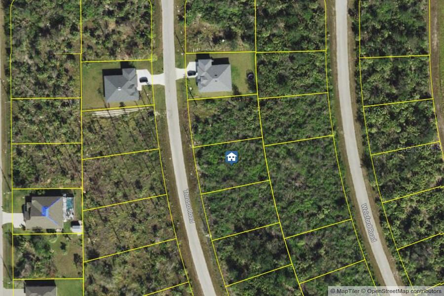 This is an aerial map view showing a vacant residential lot marked with a house icon — 8070 THRUSO ROAD, PORT CHARLOTTE, FL