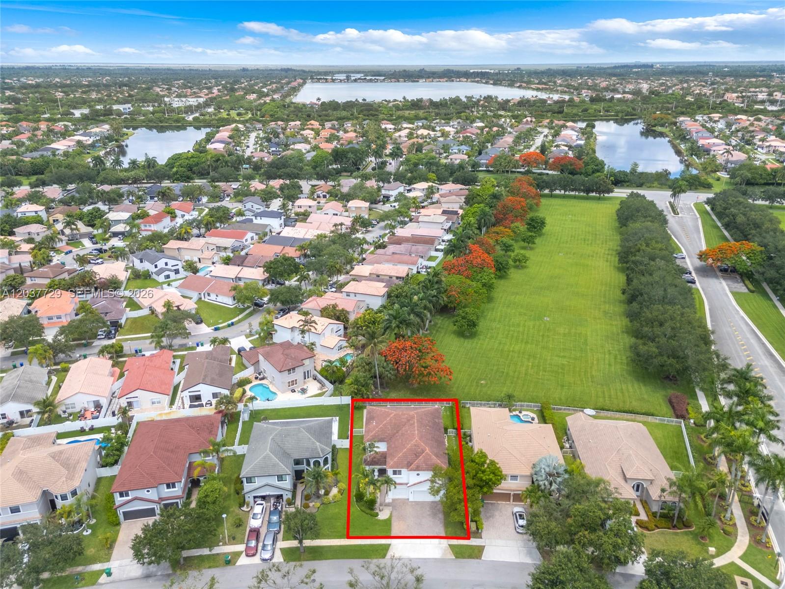 An aerial view shows a single-family home with a red-tiled roof in a residential neighborhood — 2128 SW 176th Ter, Miramar FL 33029, MIRAMAR, FL